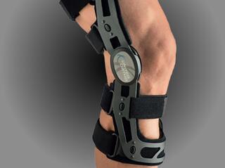 A knee brace featuring a sleek design with adjustable straps, providing support and stability to the leg while allowing mobility.